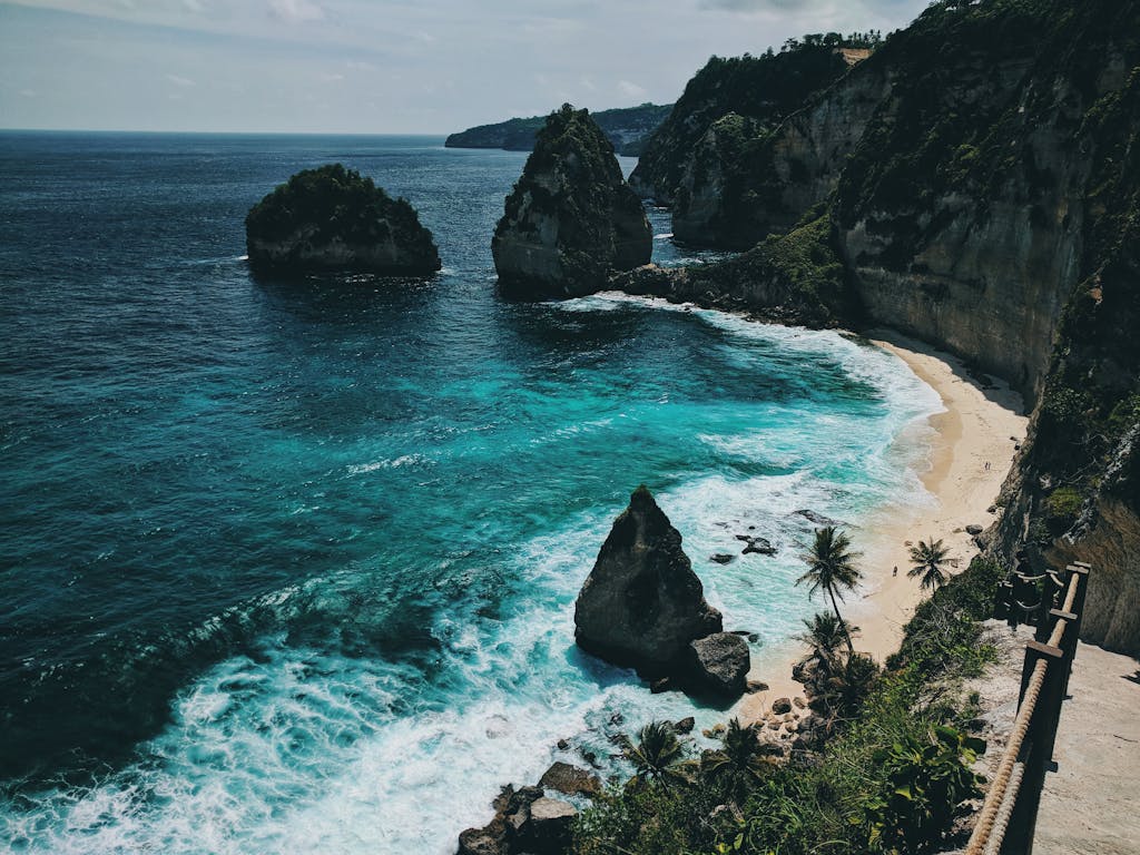 Explore the breathtaking cliffs and turquoise waters of Bali's scenic coastline.