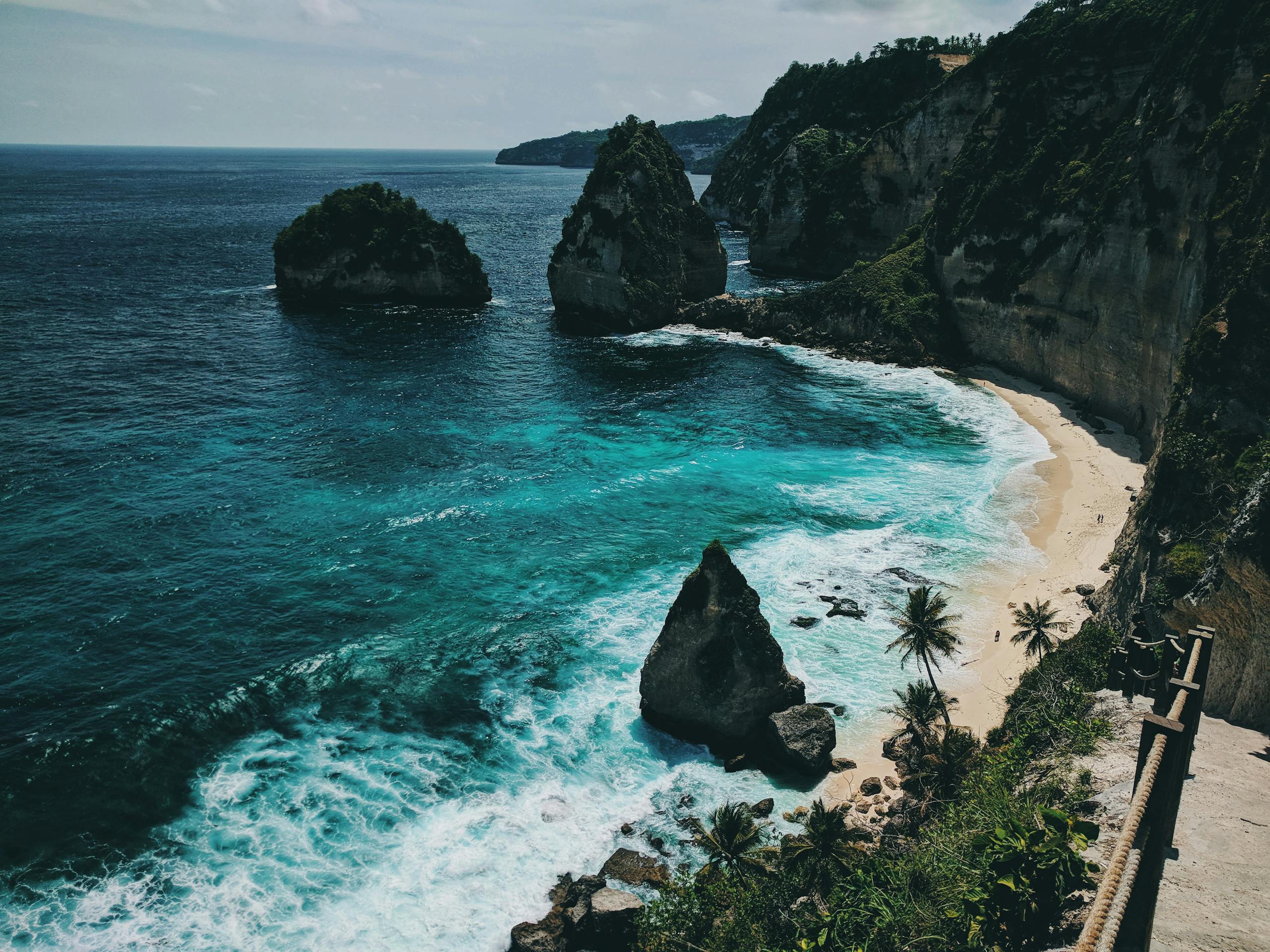 Explore the breathtaking cliffs and turquoise waters of Bali's scenic coastline.